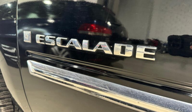 
								CADILLAC ESCALADE lleno									