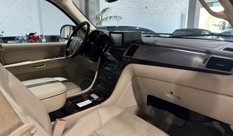 
								CADILLAC ESCALADE lleno									