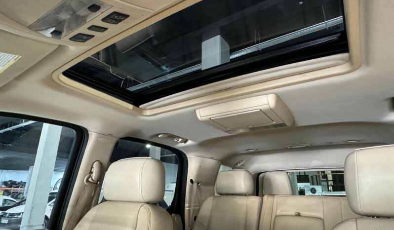 
								CADILLAC ESCALADE lleno									