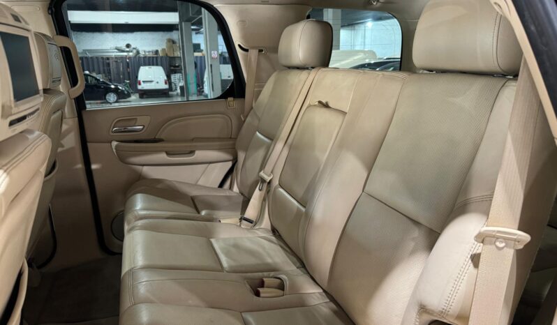 
								CADILLAC ESCALADE lleno									