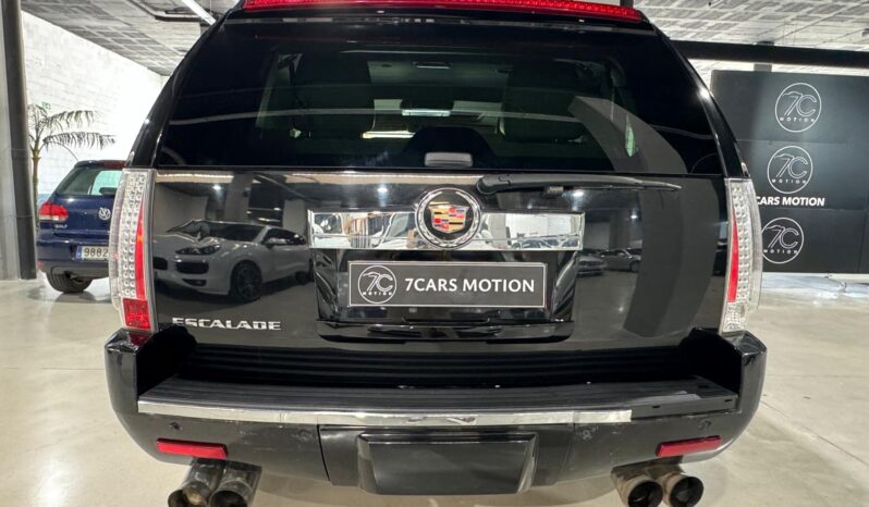 
								CADILLAC ESCALADE lleno									