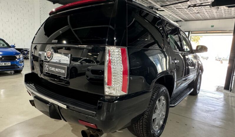 
								CADILLAC ESCALADE lleno									