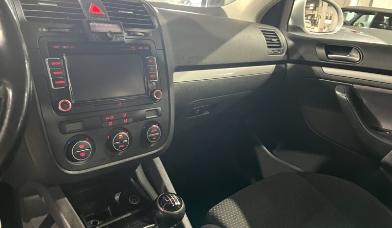 
								VOLKSWAGEN GOLF 2009 lleno									