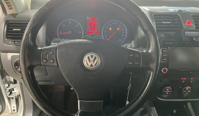 
								VOLKSWAGEN GOLF 2009 lleno									